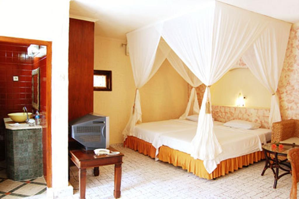 The Alit Hotel Kuta Lombok Szoba fotó